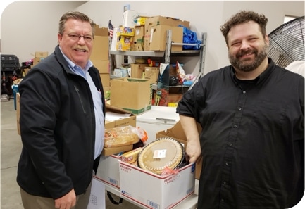 Mike Ives From Hrct Dropping Off Thanksgiving Baskets At Oasis With Burgess Hodges Who Runs The Food Pantry